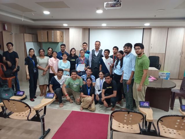 Guest speaker with students and faculty at Techno India Main Campus after the social media awareness session